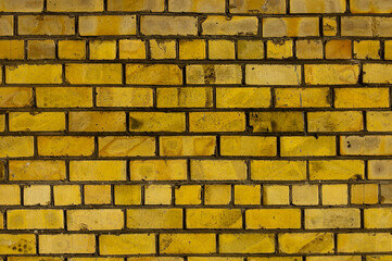 yellow background, yellow brick wall close up