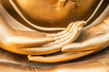 Fototapeta premium Buddha hands, Seema Malaka a Buddhist temple on Beira Lake. Colombo, Sri Lanka