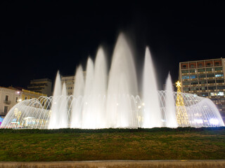 Illuminated fountains in Omonoia Square Athens