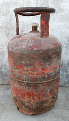 Fototapeta premium Indian Domestic LPG Gas Cylinder or Domestic Cooking gas Cylinder on land, gas cylinder on surface with space