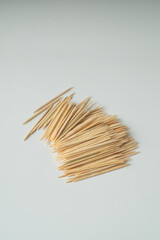 A bunch of pointed wooden sticks, commonly known as toothpicks.