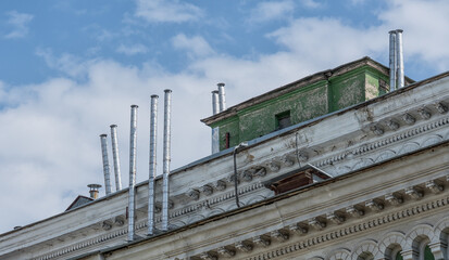 Fototapeta premium Pipes on the background of the house.