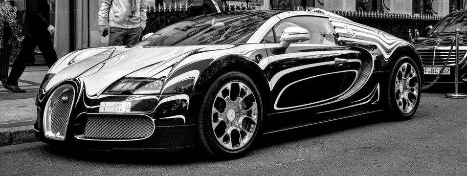 Paris, France - April 18th 2015 : Bugatti Veyron l'Or Blanc parked in Paris. Created by Bugatti and the royal manufactury of porcelain of Berlin, there's only 1 car in the world. Black and white photo