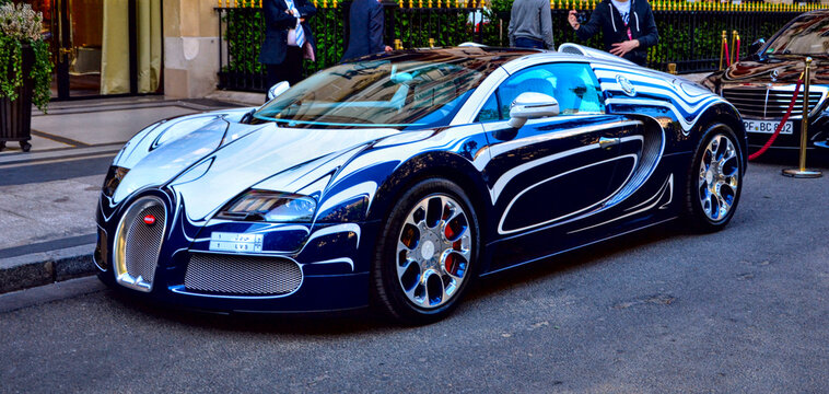Paris, France - April 18th 2015 : Side view of the Bugatti Veyron "l'Or Blanc" (White gold). Created by Bugatti and the royal manufactury of porcelain of Berlin. There is only one car in the world.