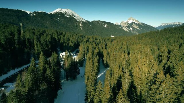 Aerial view of Col de Porte ski resort in Chartreuse mountain range close to Chamechaude in winter, French Alps