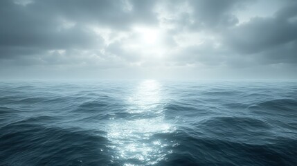 Fototapeta premium Sunlit ocean surface with dark clouds.