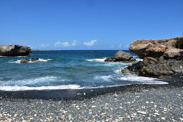 Rugged Desolate Black Sand Beach with Churning Waters