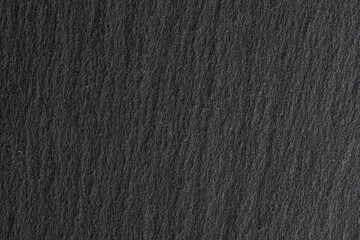 Dark grey black slate background or texture. Top view. Copy space.