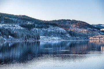 The Landscape by the lake during the winter time in Baden-Württemberg with snow and water...