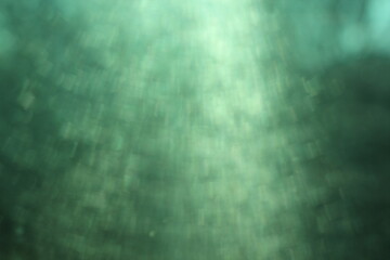 A dreamy view of an industrial area with a green filter.