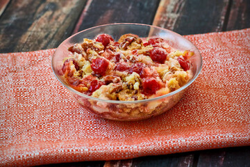 cherry dump cake served in a glass bowl