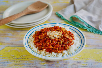 crab gumbo served over a bowl of rice