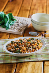 hoppin' john dish with black eye peas and collards with raw ingredients