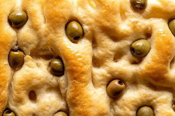 Focaccia with olives is a masterpiece of Mediterranean culinary tradition.