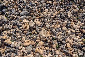 Sea texture consisting of sand and pebbles.