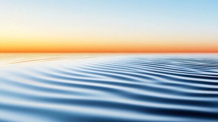 Serene sunset over calm water with gentle ripples.