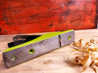 hand plane on wood background