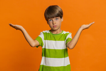 I don't know what to say. Confused preteen child boy kid feeling embarrassed about ambiguous...