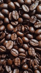 Fototapeta premium Close-up of Roasted Coffee Beans: A Rich and Aromatic Visual Feast