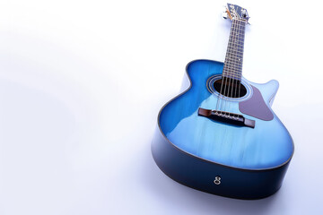 Obraz premium A close-up of a stylish blue acoustic guitar isolated on white background