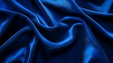 Obraz premium Draped Blue Velvet Fabric Showing Soft Waves