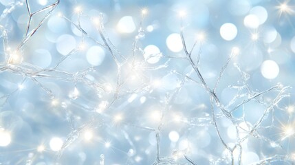 Delicate snowflakes glisten softly against a blue background filled with light, evoking a winter ambiance