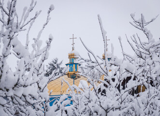 church in the winter in the Tuchyn village, Ukraine.