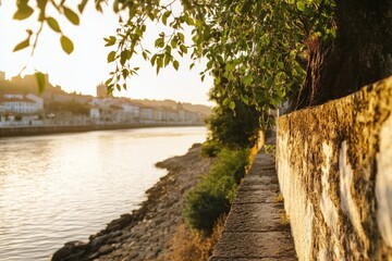 A stone wall adjacent to a calm body of water
