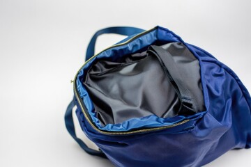 Fototapeta premium A blue bag with a zipper on it, suitable for travel or everyday use