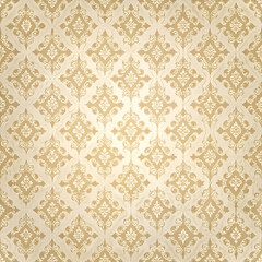 Elegant. ornate damask pattern in cream and gold.