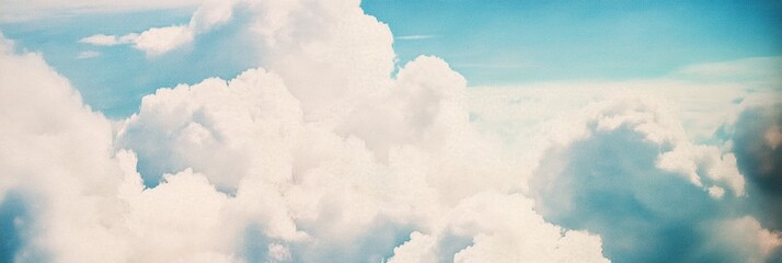 Vintage sky photography, giant fluffy cumulus cloud, retro teal background, nostalgic summer atmosphere, dreamy cloudscape, high contrast, textured cloud surface, wispy cirrus clouds, sun-drenched sky