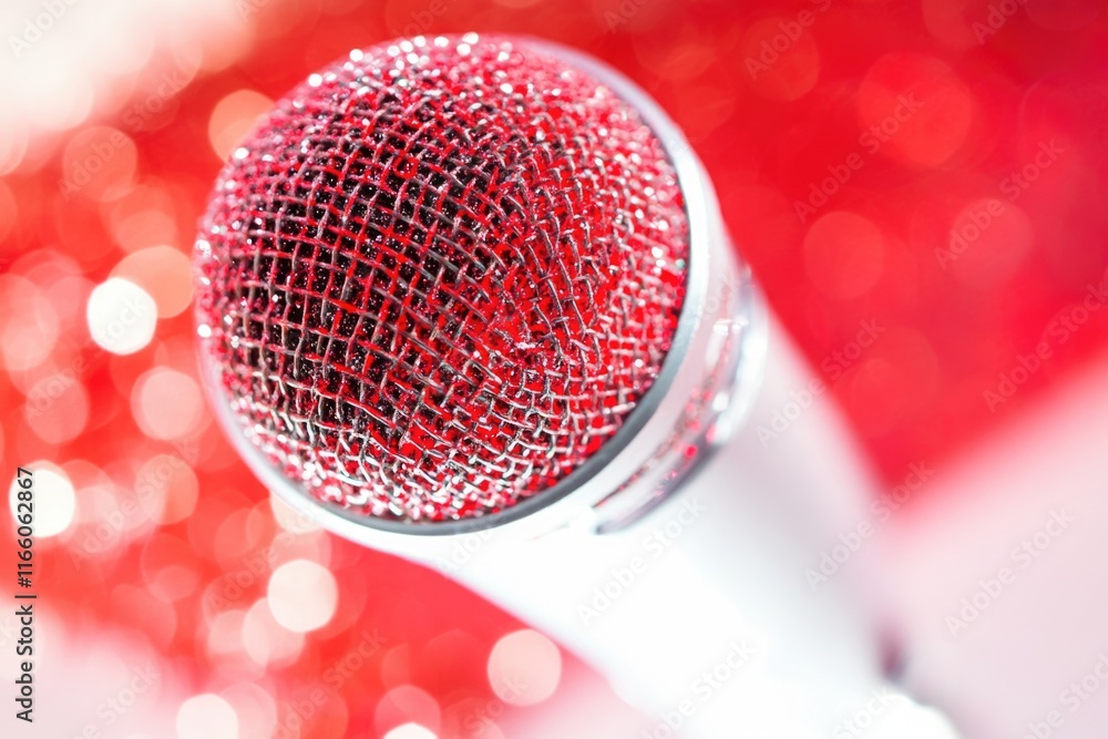 Aufkleber a close-up shot of a microphone lying on a table