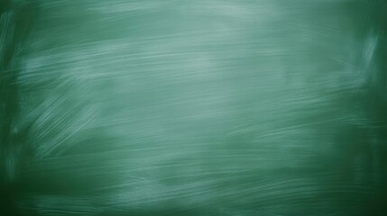 Green chalkboard texture, erased chalk marks, empty blackboard, school classroom background, dusty surface, vintage education concept, minimalist design, muted tones, horizontal banner, blank slate
