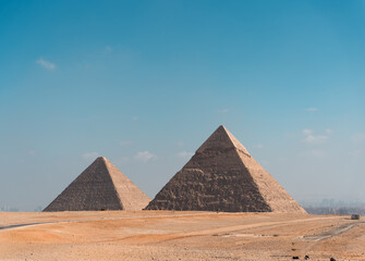 Great Pyramids of Giza with the rising behind