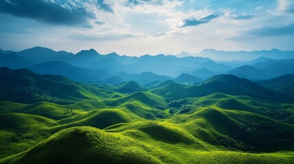 Vibrant Rolling Hills Under a Dramatic Sky With Soft Sunlight Illuminating the Lush Green Landscape and Distant Mountains in the Background