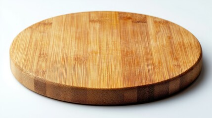 Round empty bamboo cutting board on white.