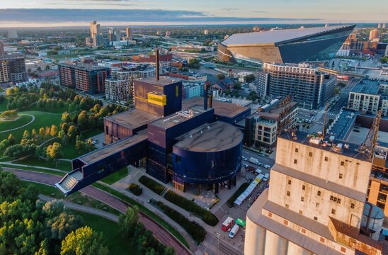 Aerial view of Minneapolis, MN, showcasing US Bank Stadium, modern architecture, and urban parkland. Cityscape with mixed-use development. Guthrie Theater, Minneapolis, Minnesota, United States