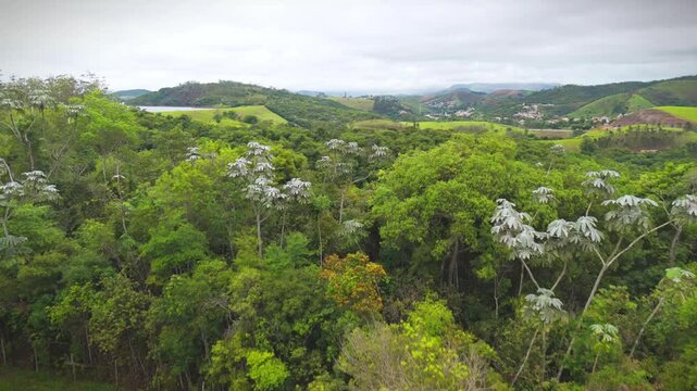 aerial view of the countryside of Sao Paulo state in Brazil with views of river and mountains and a few clouds