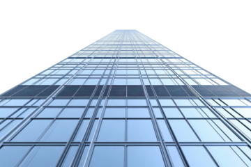 Tall glass building reaching towards a clear sky showcasing modern architectural design