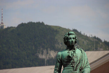 Mozart in front of a Mountain