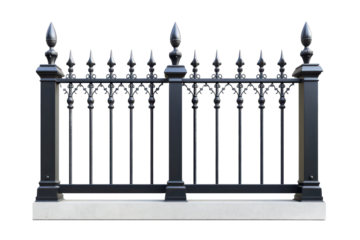 Ornate black iron fence with pointed tops installed along a white concrete base in a residential area