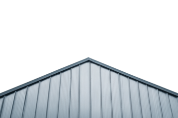 Architectural details of a modern metal roof against a clear sky captured from a low angle