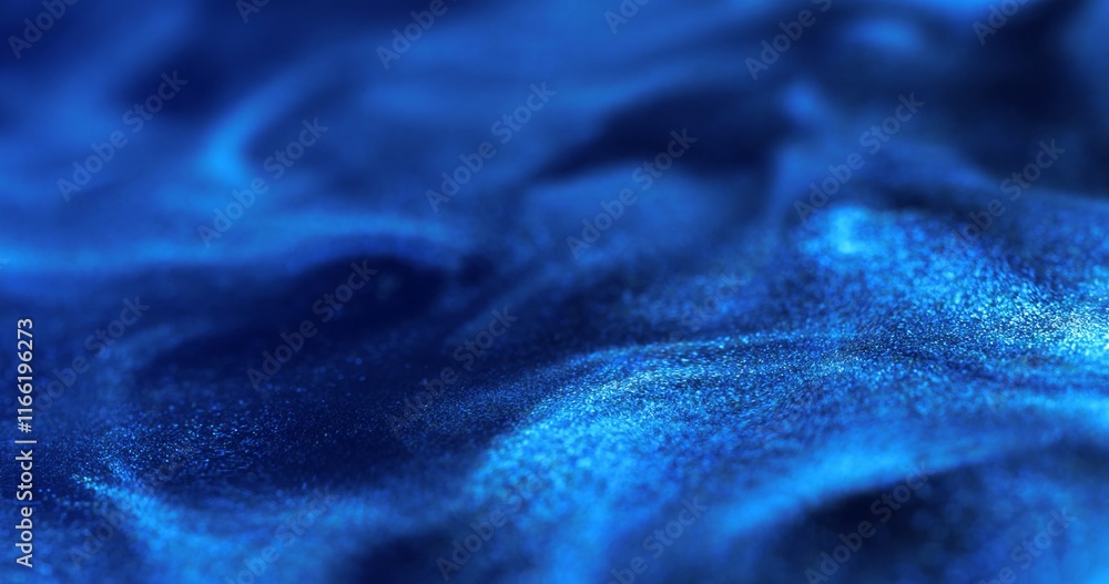 Poster a rich, deep blue surface with swirling, wave-like patterns and a shimmering texture of fine particl