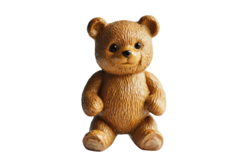 Cute teddy bear figurine made of resin sitting on a white background