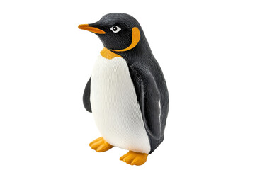Fototapeta premium Penguin figurine on a white background highlighting its unique features and colors