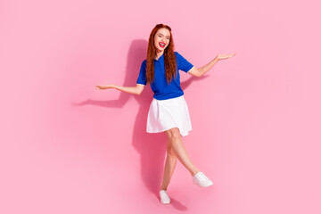 Photo of charming positive woman wear blue stylish outfit isolated on pink color background