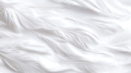 Obraz premium Close-up of soft, white feathers arranged in a flowing pattern, creating a smooth, textured background.