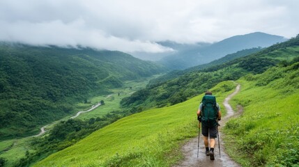 Scenic Hiker Exploring Lush Green Valley Under Overcast Sky with Mountains in Background