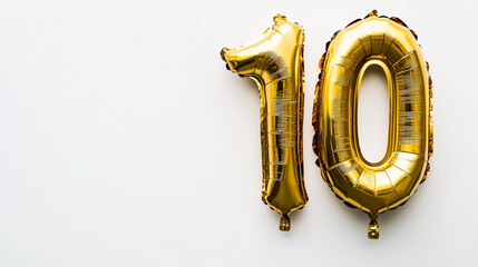 Number 10 gold foil balloon isolated on a white background
