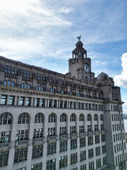 Obraz premium Historical and Modern Central Town Center and Downtown Buildings at British City Centre of Liverpool, Maritime city in northwest England, United Kingdom on Beach and Ocean Docks. May 5th, 2024. 